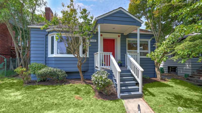 Charming craftsman home in the heart of the Ravenna neighborhood in Seattle showcasing a desirable covered front porch.