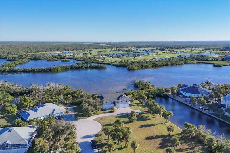 Captivating expansive views overlooking Coral Creek & the Coral Creek Club & Golf Course