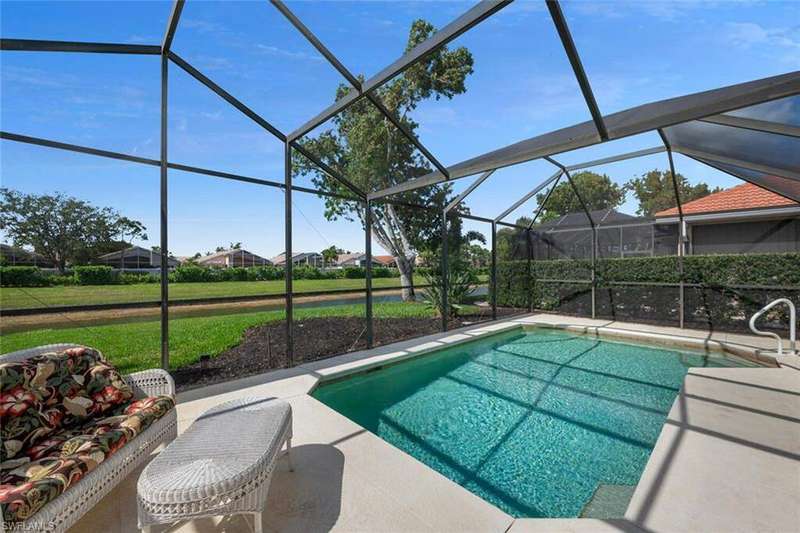 View of pool featuring a patio and a lanai