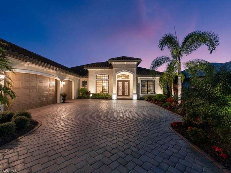 Mediterranean / spanish-style house featuring french doors and a garage