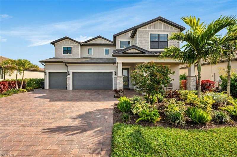 View of front of home with a garage