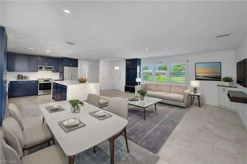 Dining room featuring light tile patterned floors